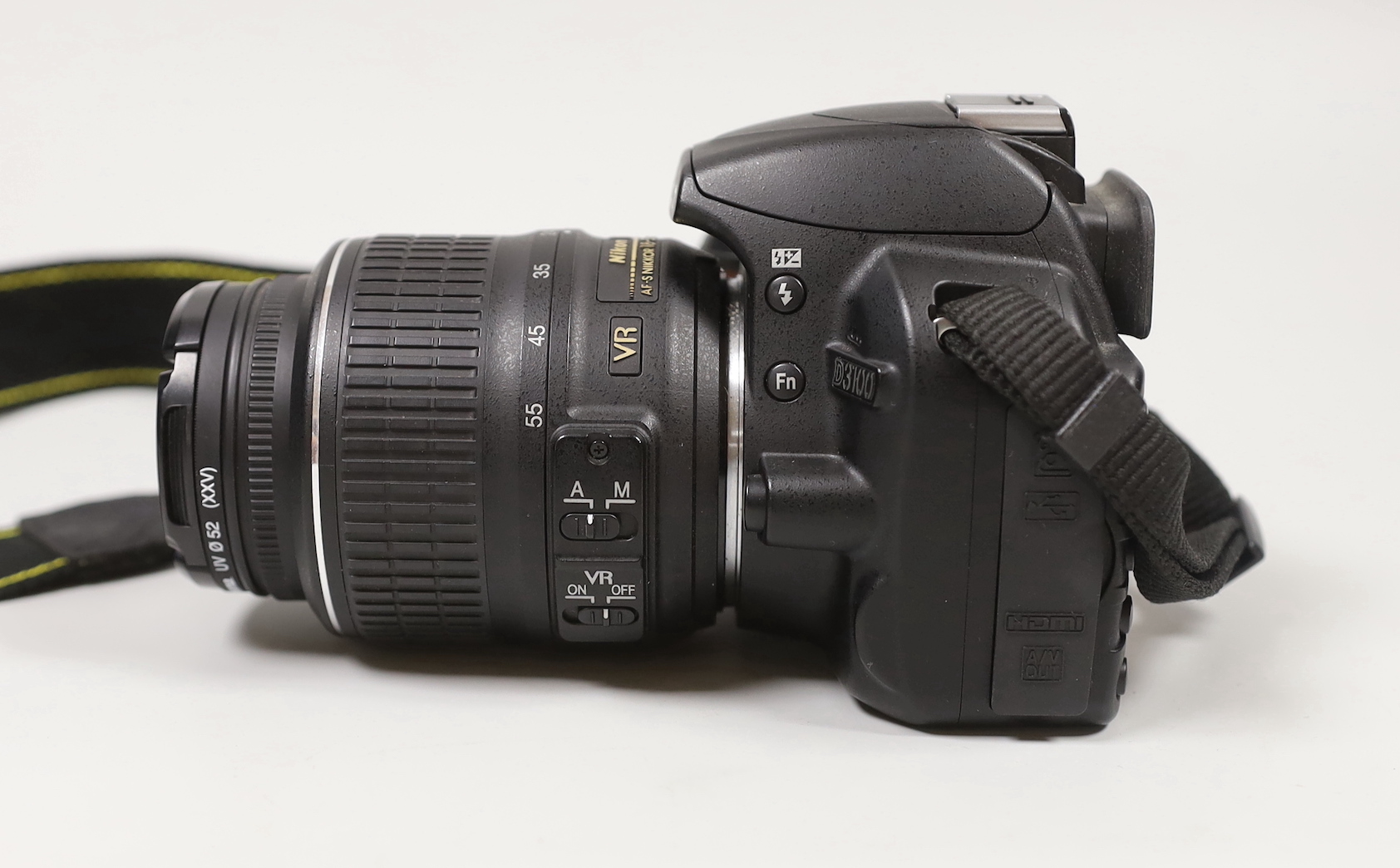 A Nikon D3100 digital camera, together with a Tamron Telephoto Lens and carrying case
